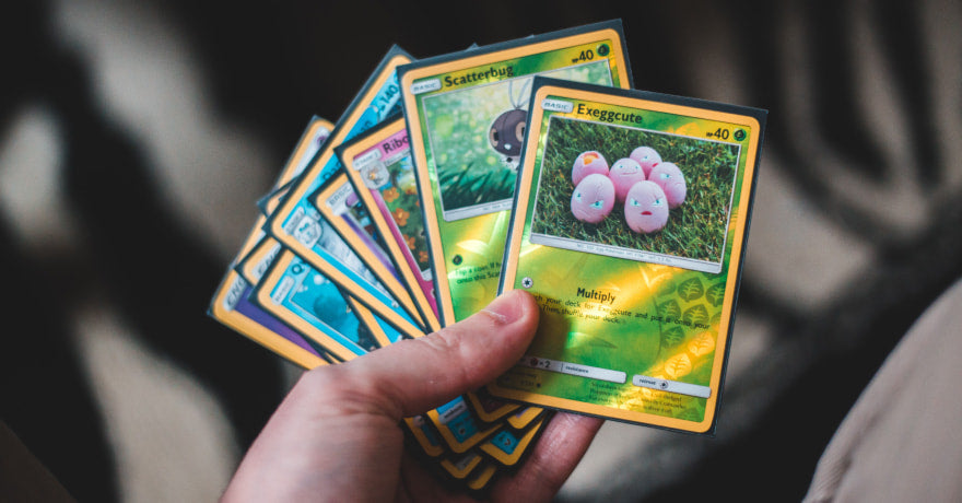 Pokemon Cards In Hand